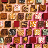 Mixed Brownies assortment by Crumbs & Doilies, featuring various flavors like classic, caramel, and rocky road brownies.